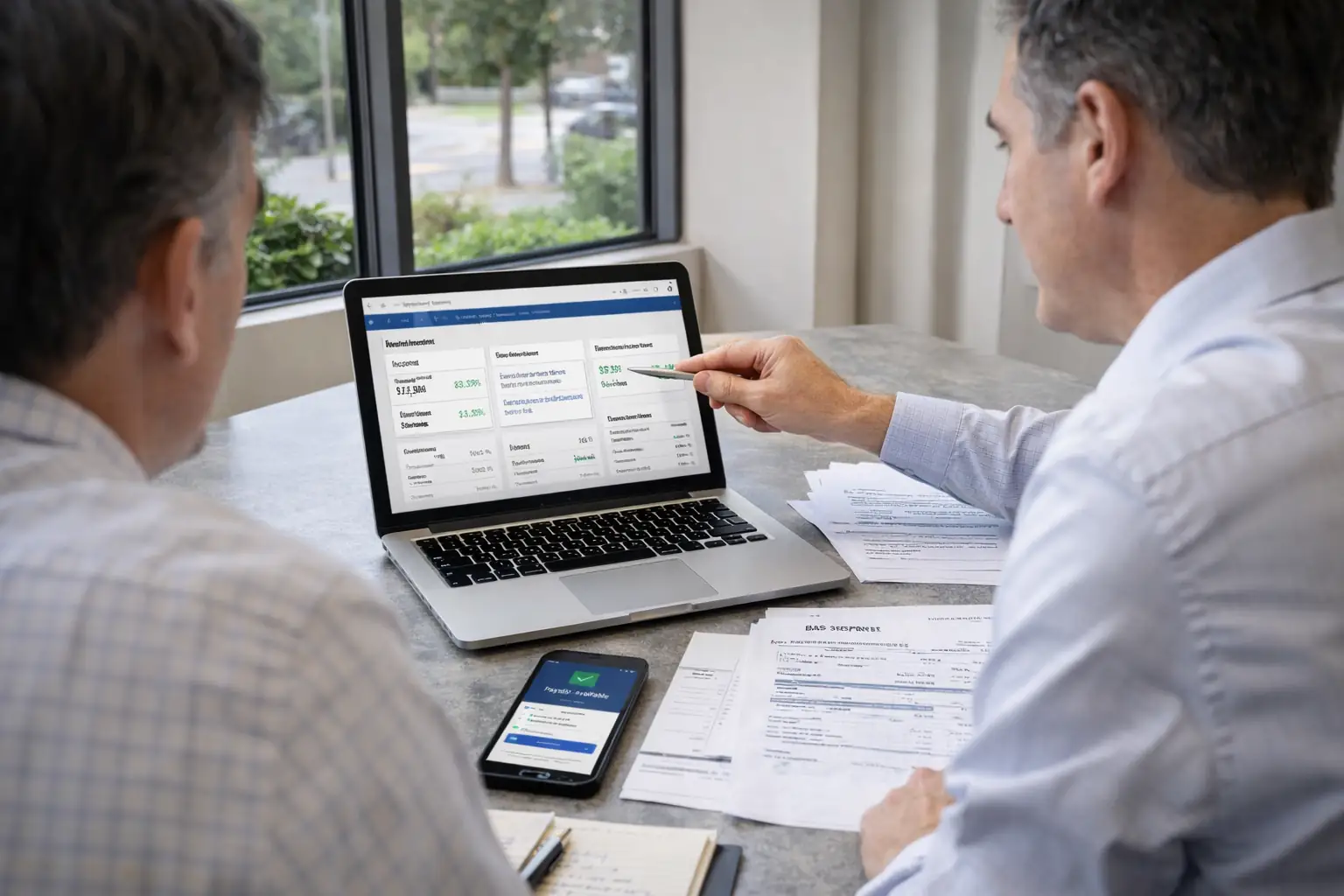 Business owner discussing financial advice with accountants in Melbourne when choosing between CBD and suburban accounting services